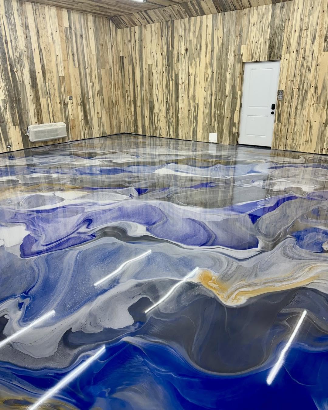Blue & Gold Metallic epoxy floor by Solidus Coatings